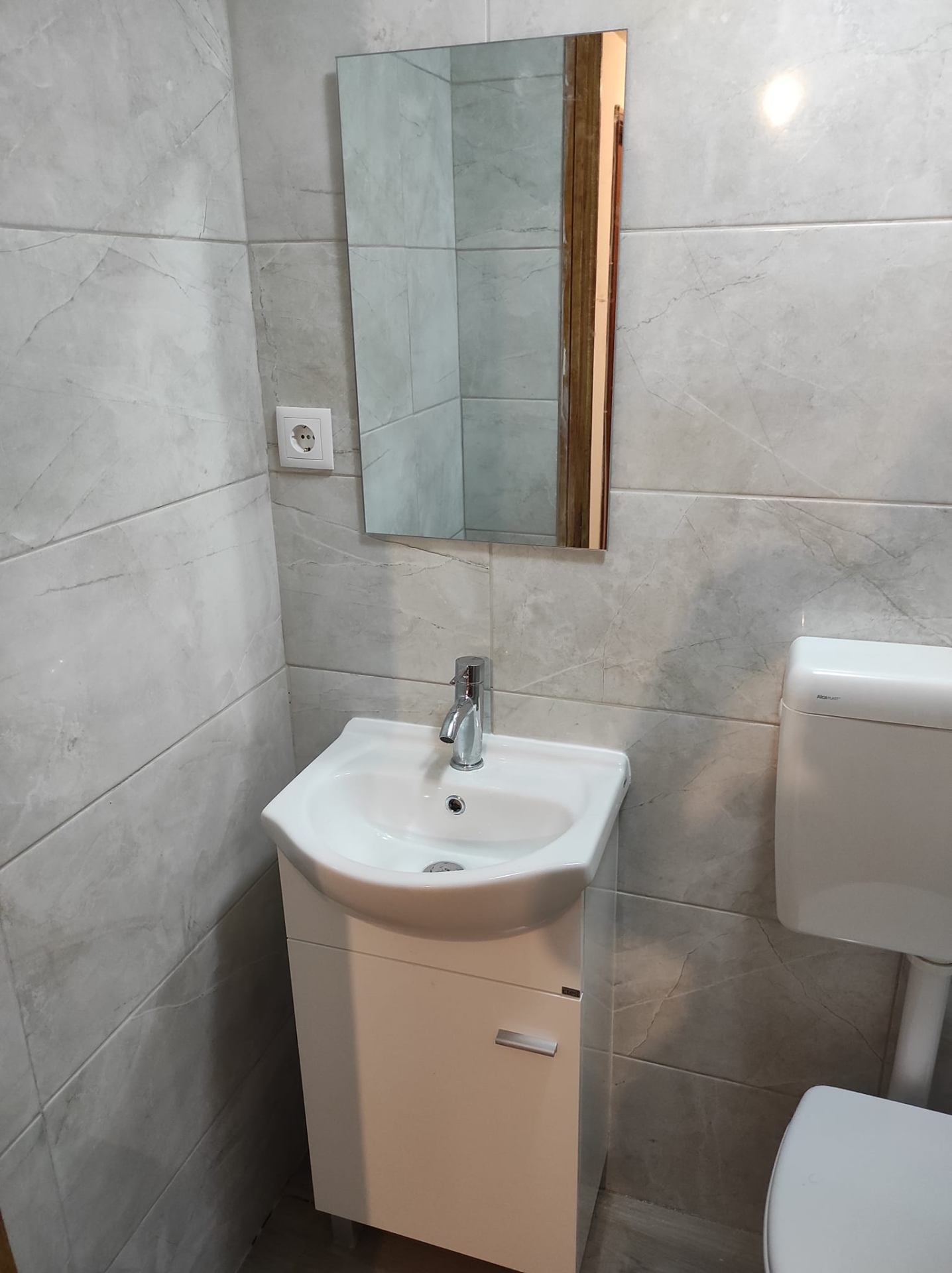 Casa de banho — mármore & lavatório