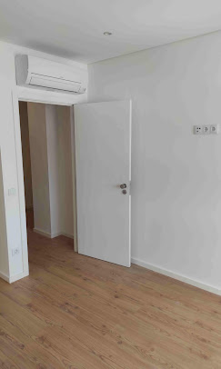 Quarto reabilitado com climatização